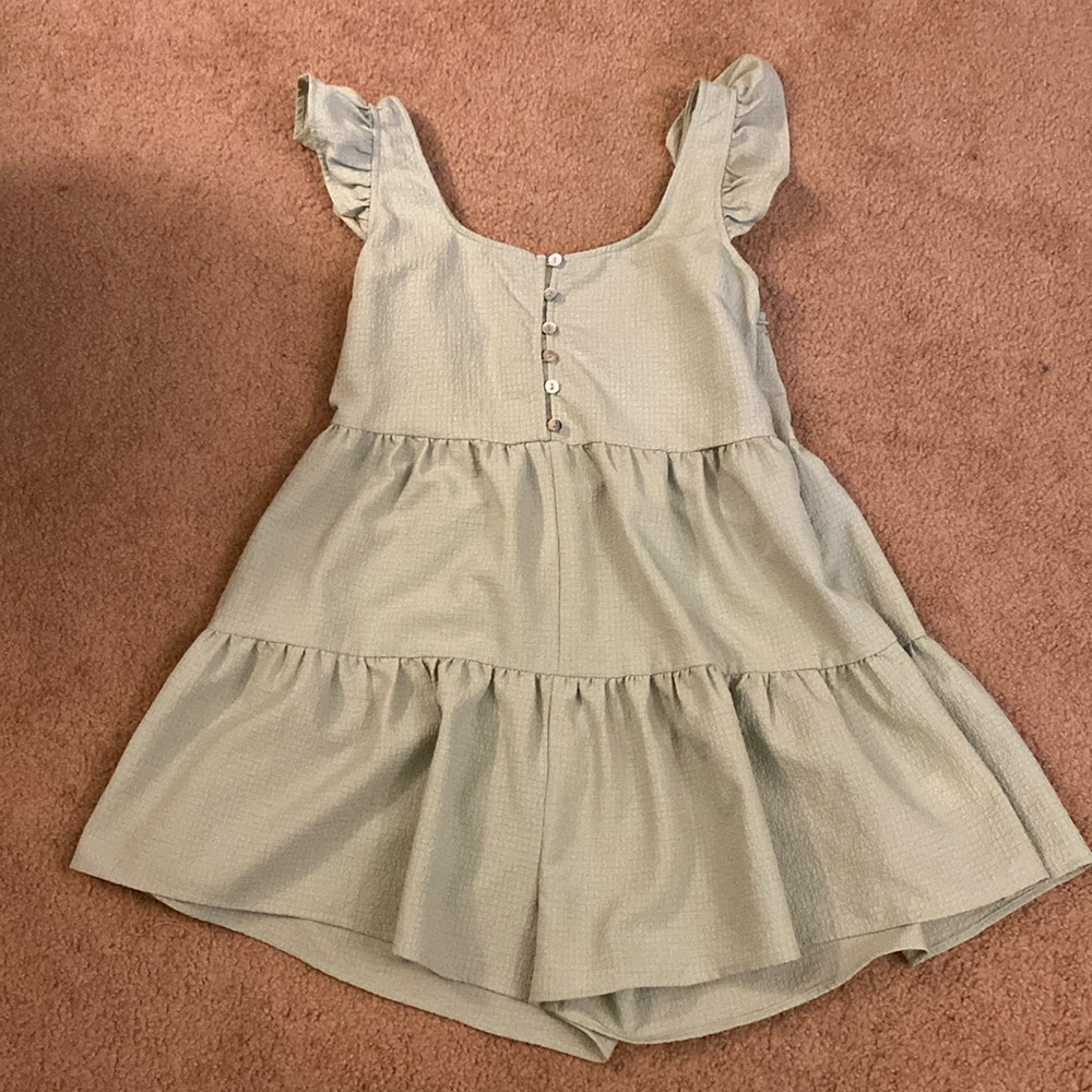 adorable green ruffle romper